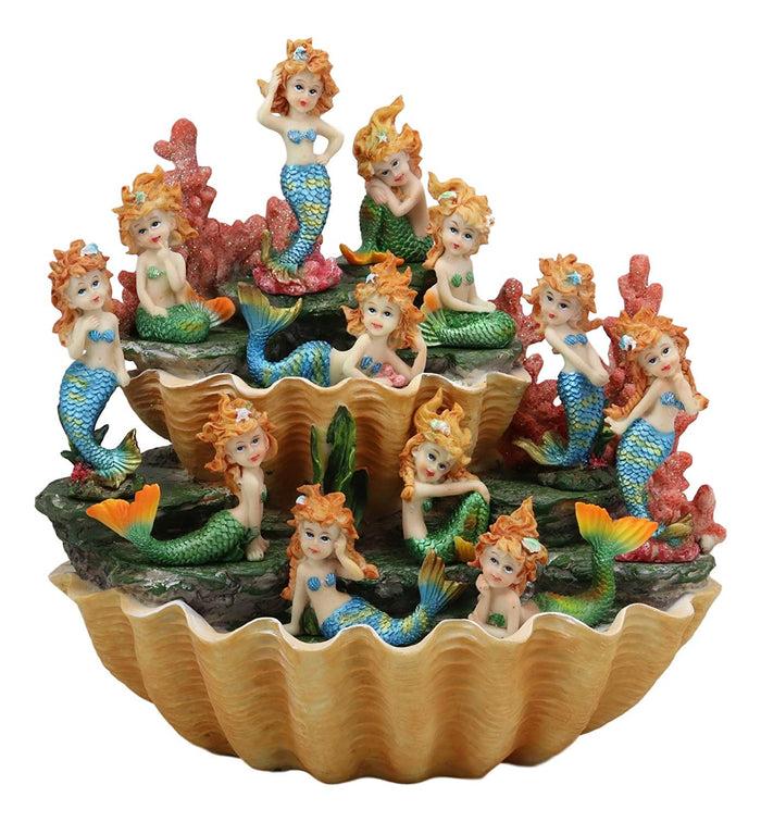 Colorful 2 Tier Golden Giant Clam Shells LED Display Stand With 12 Mini Mergirls