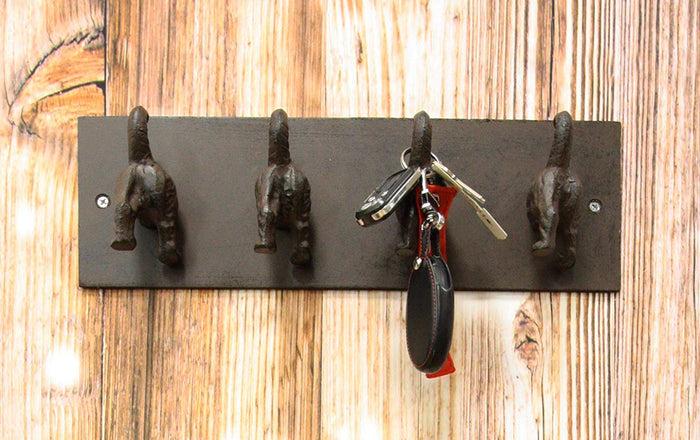 Ebros Cast Iron Whimsical Rustic Wagging Dog Tails 4 Pegs Quad Wall Hooks 15.25" Wide Hanger Dogs Themed Wall Mount Leash Coat Hat Keys Hook Decor Hanging Sculpture Plaque Ebros Cast Iron Whimsical Rustic Wagging Dog Tails 4 Pegs Quad Wall Hooks 15.25" Wide Hanger Dogs Themed Wall Mount Leash Coat Hat Keys Hook Decor Hanging Sculpture Plaque