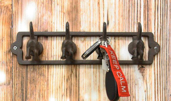 Ebros Cast Iron Whimsical Rustic Wagging Puppy Dog Tails 4 Pegs Quad Wall Hooks 13.75" Wide Hanger Dogs Themed Wall Mount Leash Coat Hat Keys Hook Decor Hanging Sculpture Plaque Ebros Cast Iron Whimsical Rustic Wagging Puppy Dog Tails 4 Pegs Quad Wall Hooks 13.75" Wide Hanger Dogs Themed Wall Mount Leash Coat Hat Keys Hook Decor Hanging Sculpture Plaque