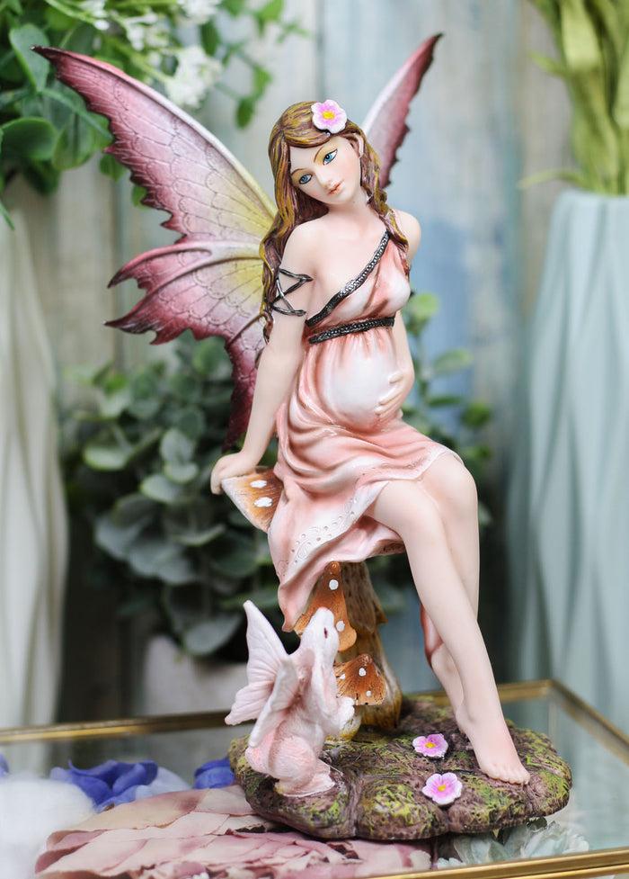 Ebros Fairyland 8 Inch Expecting a Baby Fairy Sitting on Mushroom Statue Figurine