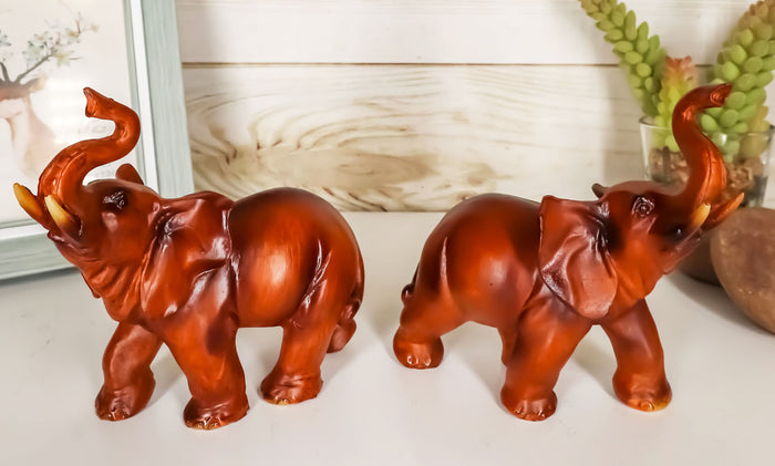 Ebros Faux Wood Feng Shui Elephant with Trunk Up Statue Set of 2 Thai Buddhism