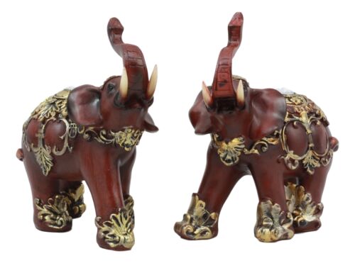 Ebros Faux Wood Feng Shui Elephant with Trunk Up Statue Set of 2 Long Decorated Thai Buddhism Noble Elephant Trumpeting Left and Right Directions Animal Sculpture Ebros Faux Wood Feng Shui Elephant with Trunk Up Statue Set of 2 Long Decorated Thai Buddhism Noble Elephant Trumpeting Left and Right Directions Animal Sculpture