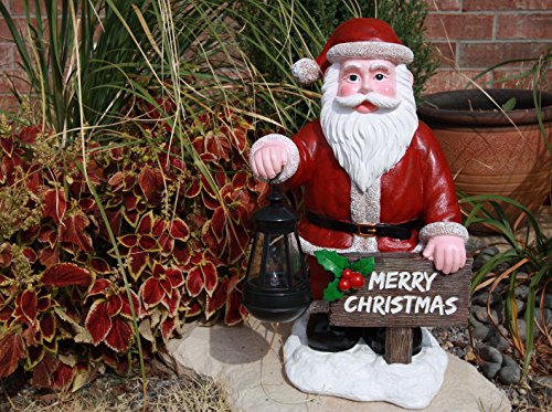Ebros Jolly Seasons Merry Christmas Santa Claus Holding Greeting Sign Decorative Statue With Solar LED Light Lantern Lamp 16.5"H As Home Patio Welcome Entrance Decor Guest Greeter Figurine