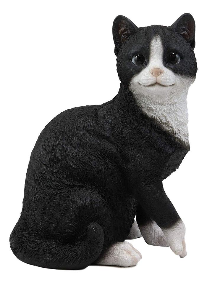 Ebros Lifelike Sitting Tuxedo Black And White Cat With Paw Up Statue 10.25" Tall Realistic Glass Eyes Hand Painted Feline Cats Kittens Kitties Animal Pet Sculpture Decor Figurine