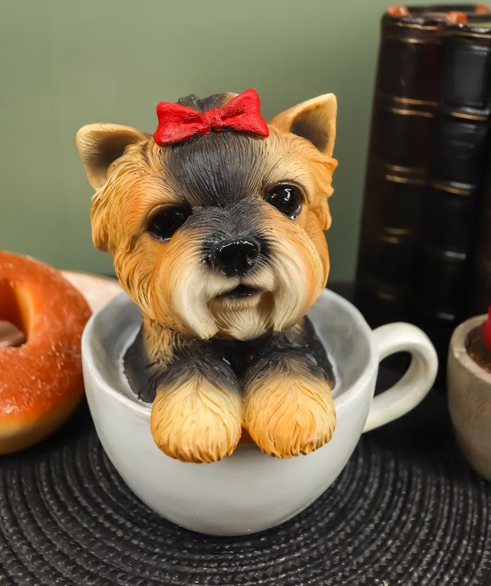 Ebros Realistic Adorable Yorkie Dog with Red Ribbon in Teacup Statue 6"H Ebros Realistic Adorable Yorkie Dog with Red Ribbon in Teacup Statue 6"H