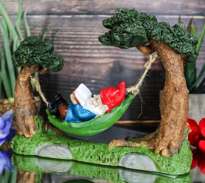 Ebros Whimsical Bookworm Gnome Sleeping On Hammock By Toadstool Mushrooms Forest Tree Ents Statue 6.5" Wide