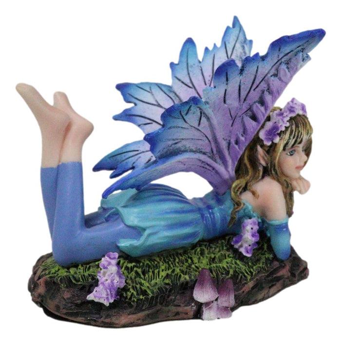 Fantasy Pink And Blue Girl Princess Fairy Lying On Lavender Meadows Figurine