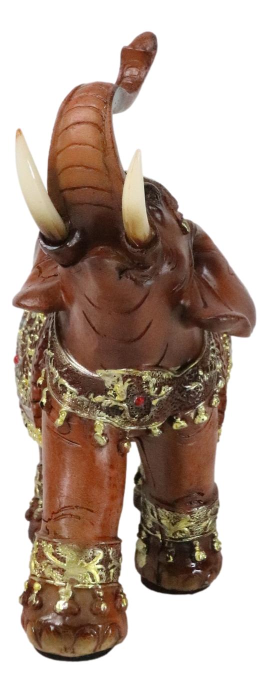 Faux Wood Trunk Up Elephant With Golden Scrollwork And Crushed Glass Figurine