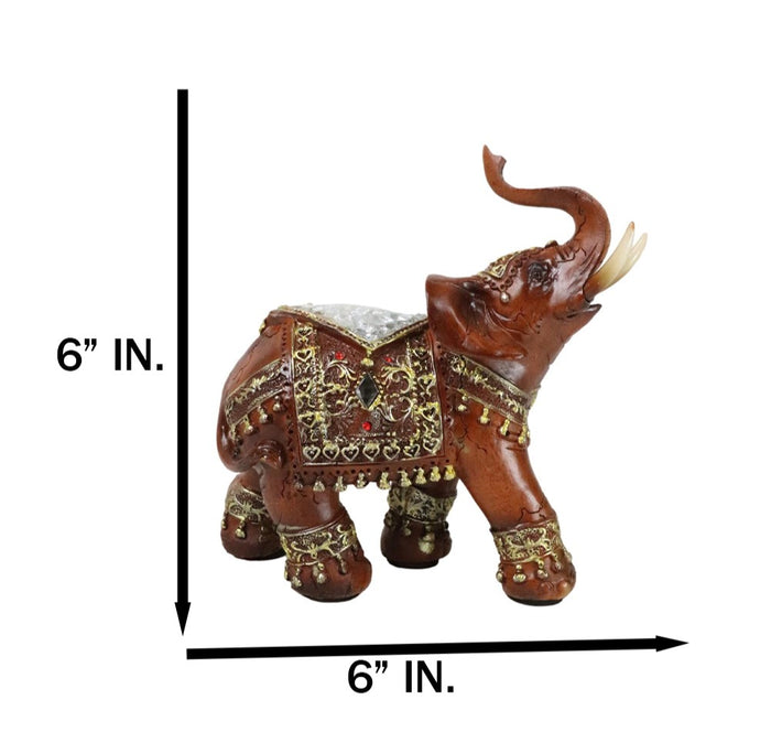 Faux Wood Trunk Up Elephant With Golden Scrollwork And Crushed Glass Figurine