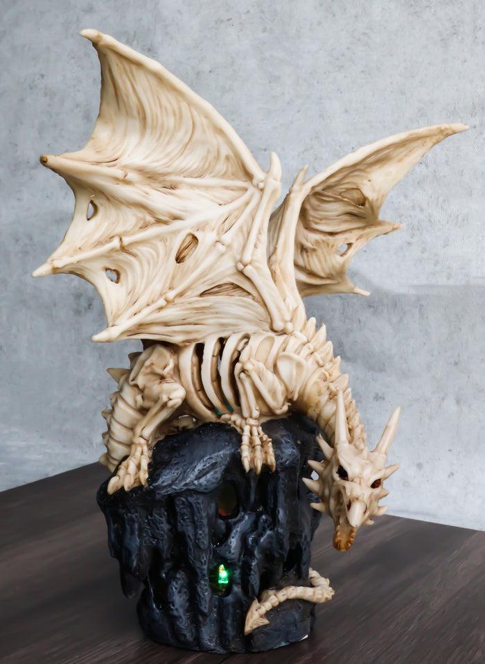 Gothic Exo Skeleton Dragon On Rock Cavern With Colorful LED Light Figurine Gothic Exo Skeleton Dragon On Rock Cavern With Colorful LED Light Figurine