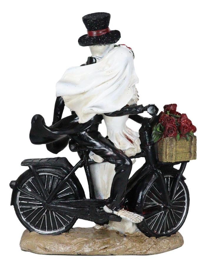 Love Never Dies Skeleton Bridal Couple On Bicycle With Basket Of Roses Figurine