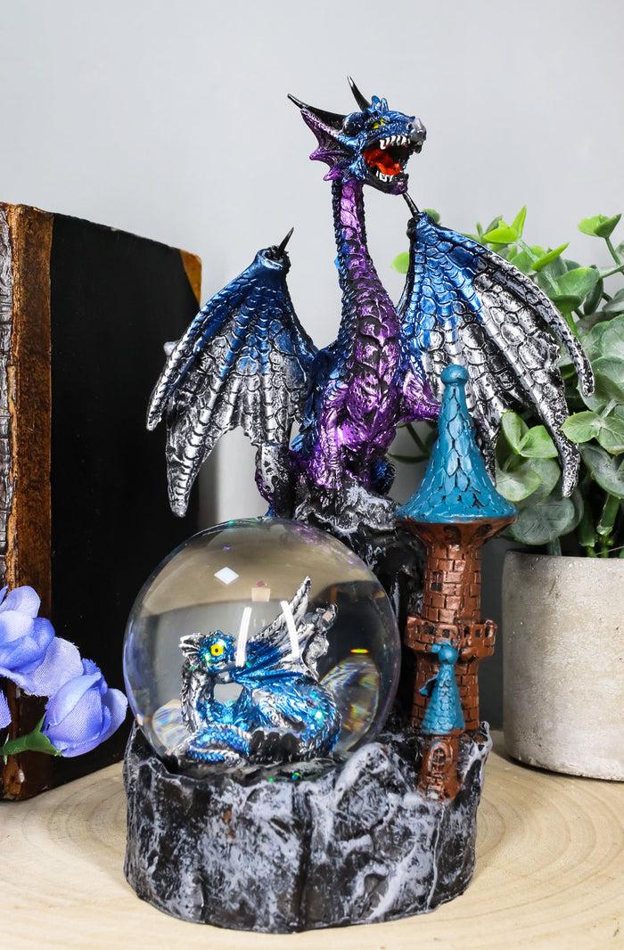 Metallic Blue Dragon On Cliff Rocks Castle With A Wyrmling Water Globe Statue