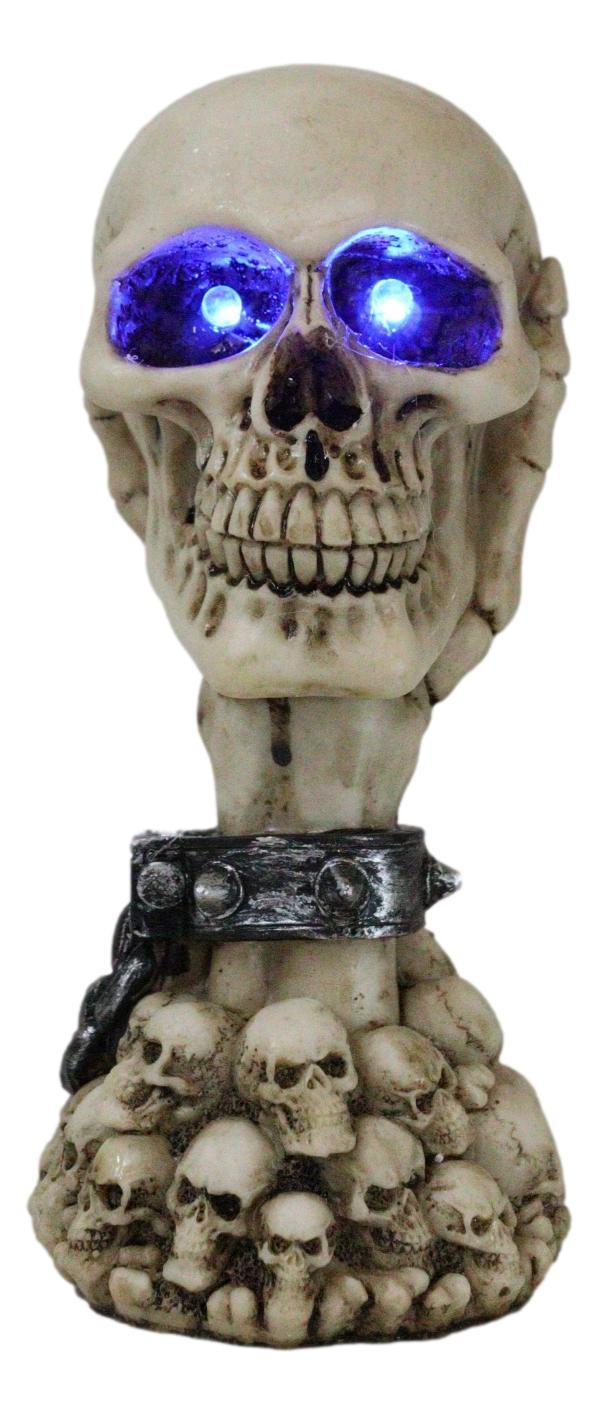 Shackled Skeleton Hand Holding Skull With LED Eyes With Morphing Skulls Figurine