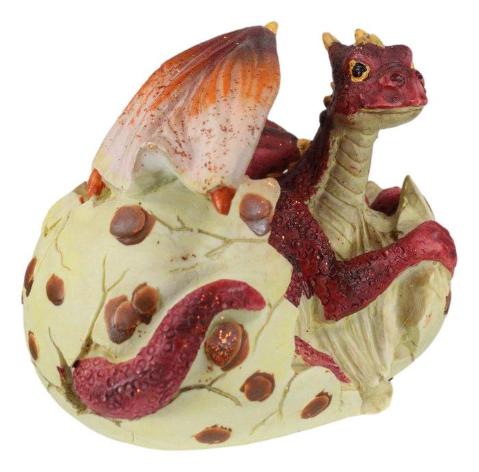 Small Sparkly Red Lava Whimsical Dragon Baby Emerging From Spotted Egg Figurine