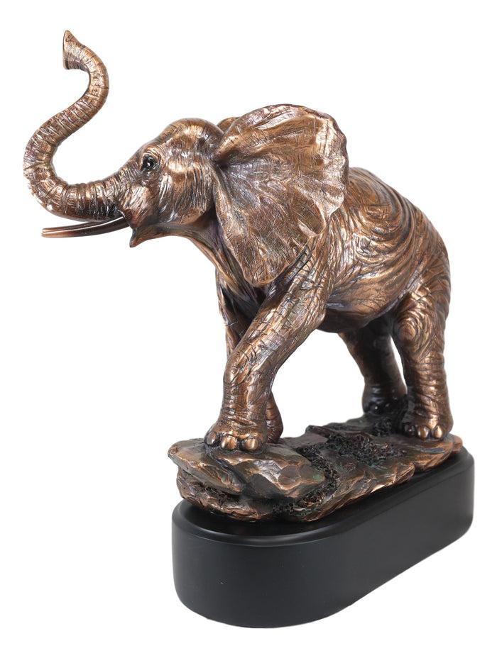 Ebros Large African Long Tusked Elephant Marching W/ Trunk Raised Statue W/ Base